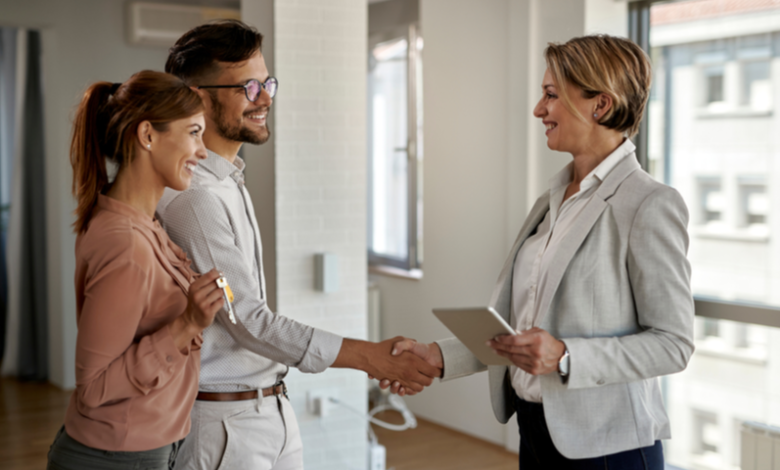 happy real estate agent young couple